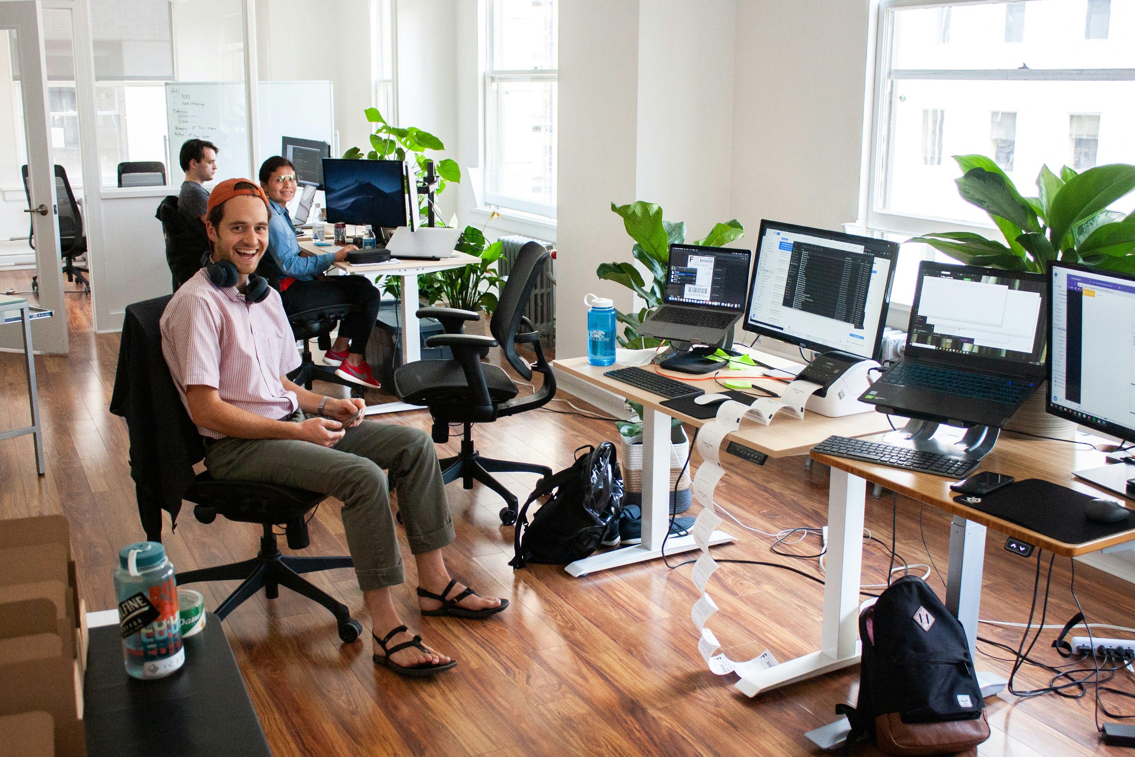 People working in a modern open office space