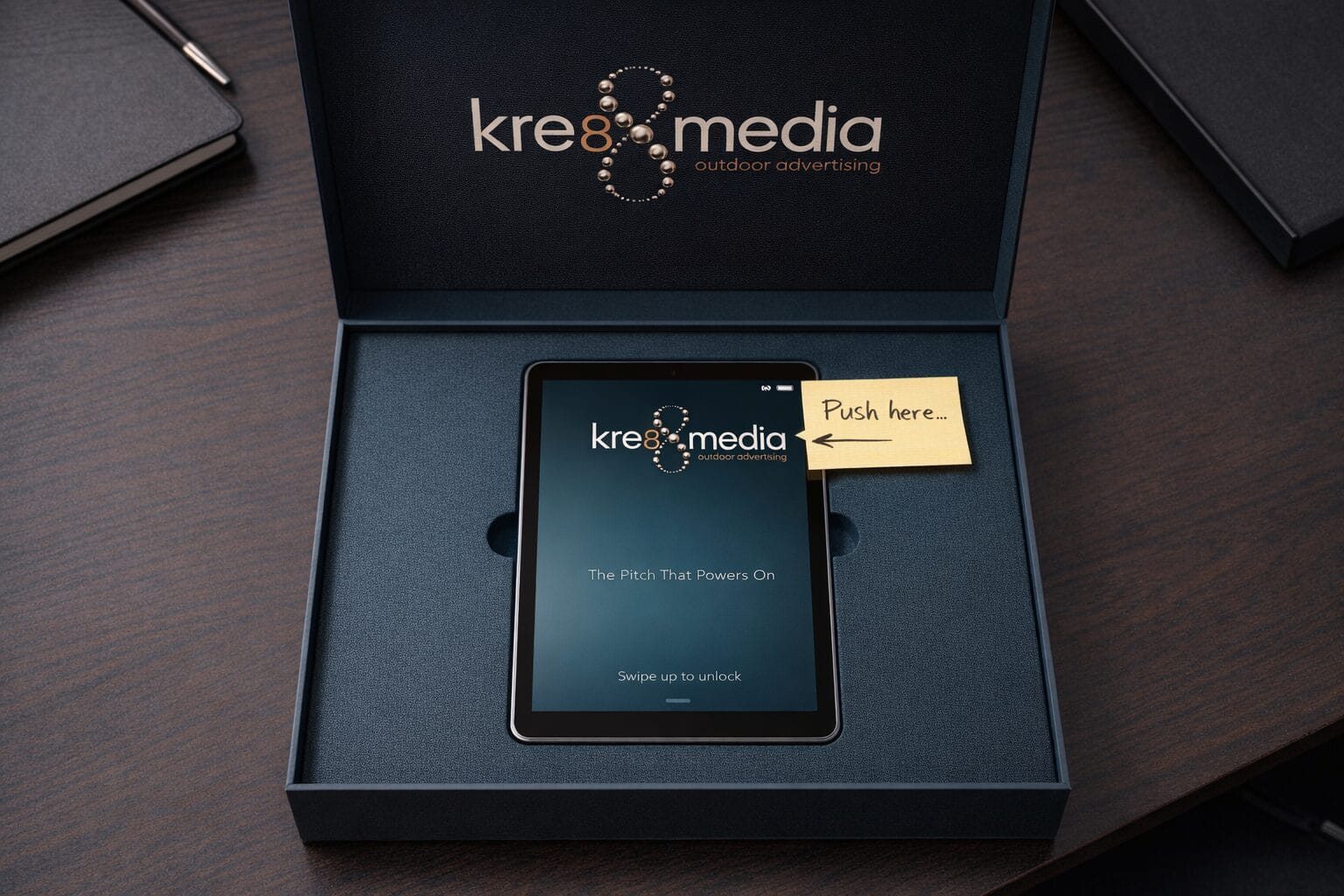 Tablet in branded presentation box on desk