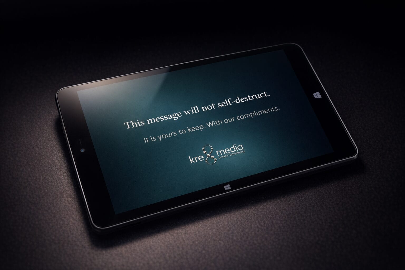 Tablet displaying marketing message from advertising company